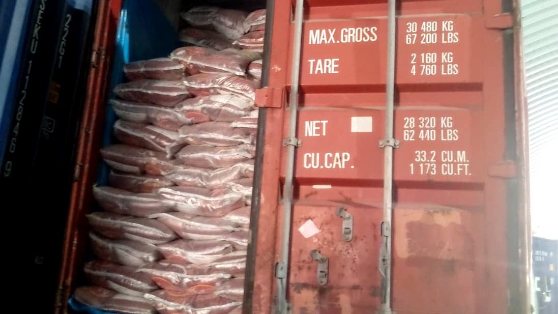 Export container close-up — bag stacking